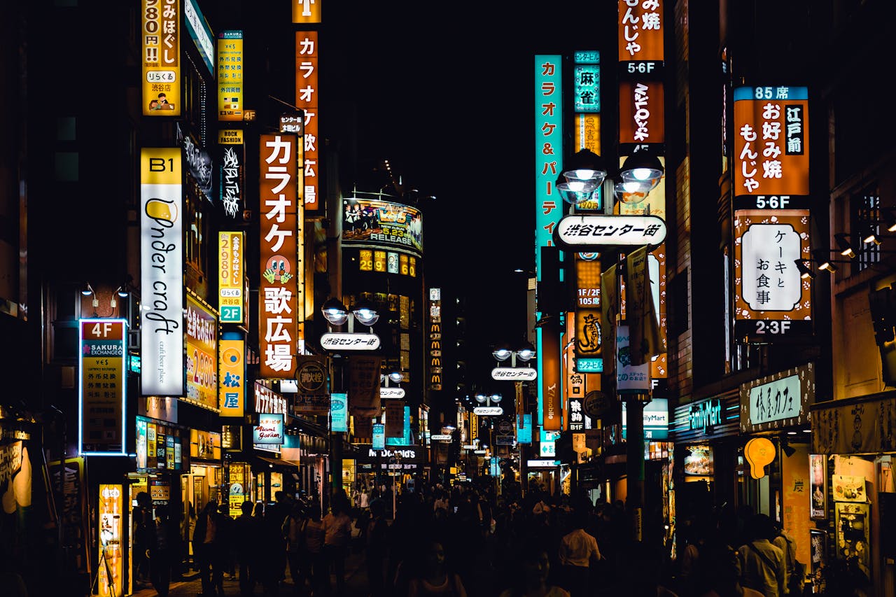 Crafting Captivating Headlines: Your awesome post title goes here Bustling Shibuya street at night with bright neon signs and crowds, showcasing Tokyo's vibrant nightlife.