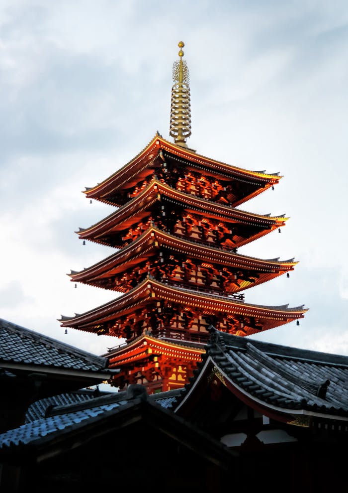 services-03 Stunning view of a traditional five-storied pagoda at sunset in Tokyo, Japan.